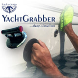 yacht crabber i bruk under vasking av et båtskrog